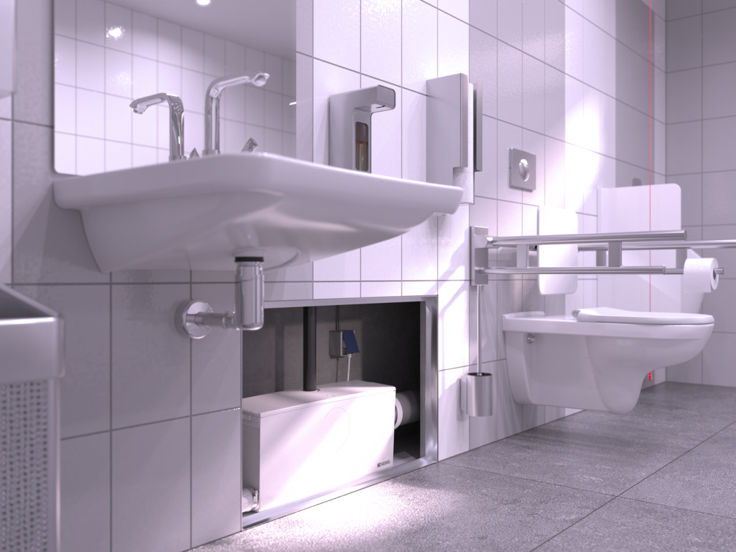 Close-up van een in de voorwand ingebouwde kleine opvoerinstallatie met aangesloten toilet en wastafel.