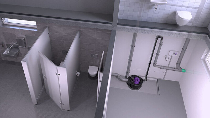 Voorbeeld van de installatie van een pompstation bij een openbaar toilet Voorbeeld van de installatie van een pompstation bij een openbaar toilet
